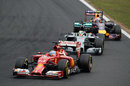 Fernando Alonso leads Lewis Hamilton and Daniel Ricciardo during the thrilling climax