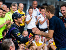 Sebastian Vettel congratulates team-mate Daniel Ricciardo on his win