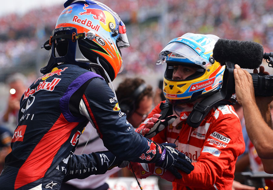Fernando Alonso congratulates Daniel Ricciardo in parc ferme