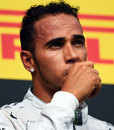 Lewis Hamilton on the podium after finishing thrid