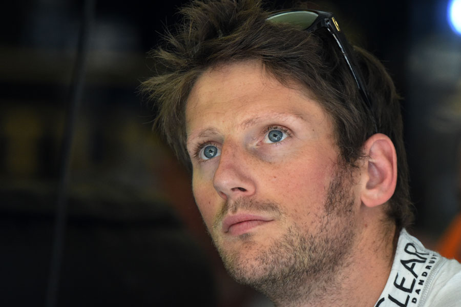 Romain Grosjean in the Lotus garage