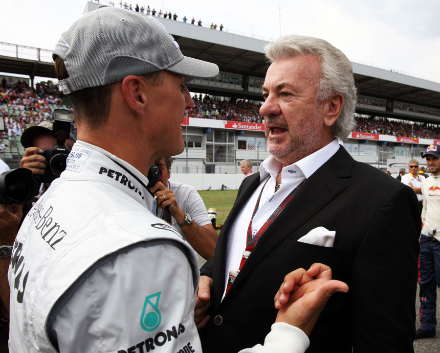 Michael Schumacher talks to former manager Willi Weber