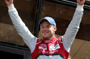 Andre Lotterer celebrates on the podium after victory in the Le Mans 24 Hours