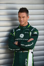 Andre Lotterer stands in his Caterham overalls in the paddock