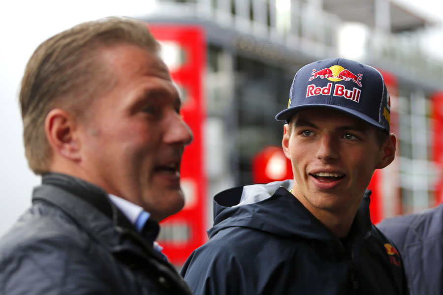 New Toro Rosso recruit Max Verstappen talks to father Jos in the paddock