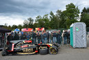 The wreckage of Pastor Maldonado's Lotus at the side of the track