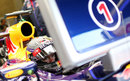 Sebastian Vettel waits in the garage during Friday practice