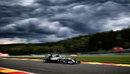 Lewis Hamilton on track under cloudy skies