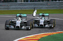 Nico Rosberg makes contact with Lewis Hamilton's left rear tyre