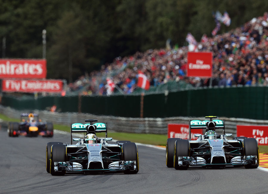 Nico Rosberg and Lewis Hamilton on the run to Les Combes