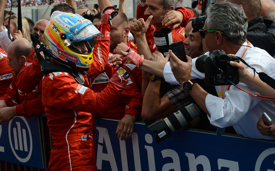 Fernando Alonso celebrates taking second place
