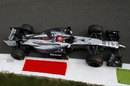 Jenson Button rides the kerb on Friday