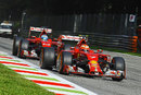 Kimi Raikkonen leads Fernando Alonso on track
