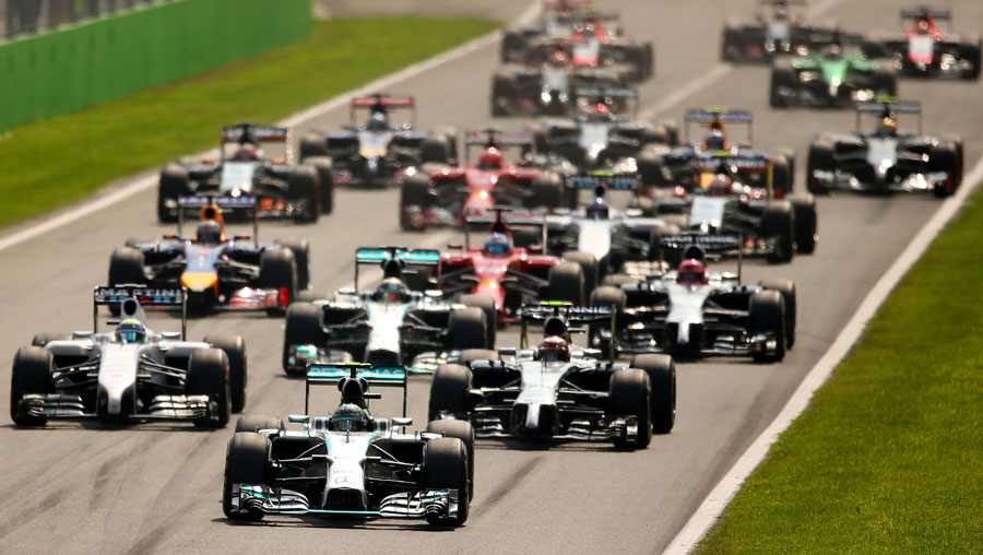 Nico Rosberg leads the pack down to Turn 1
