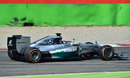 Lewis Hamilton celebrates on the victory lap