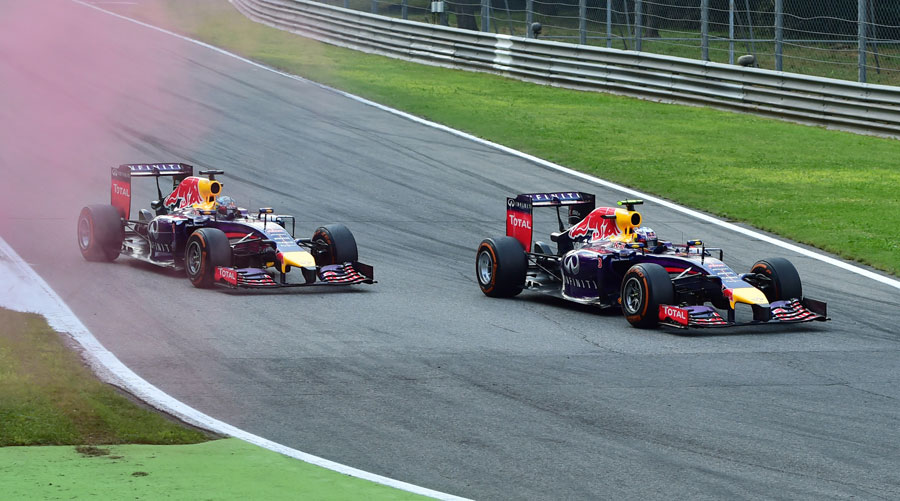 Daniel Ricciardo passes Red Bull team-mate Sebastian Vettel at the Roggia 