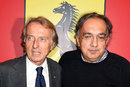 Outgoing Ferrari president Luca di Montezemolo and incoming FIAT boss Sergio Marchionne pose for a photo during a press conference