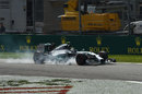 Nico Rosberg locks up on the entry to the first chicane, allowing Lewis Hamilton to get past