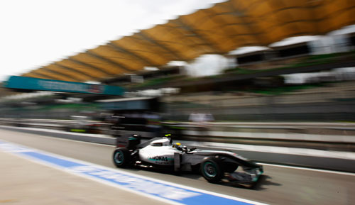 Nico Rosberg heads down the pit lane