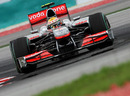Lewis Hamilton corners hard in the McLaren