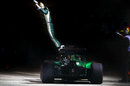 Kamui Kobayashi leaps clear of his Caterham after retiring on the formation lap