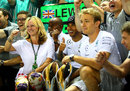 Contrasting emotions for Lewis Hamilton and Nico Rosberg as Mercedes celebrate 