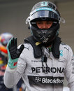 Nico Rosberg acknowledges the crowd after taking pole