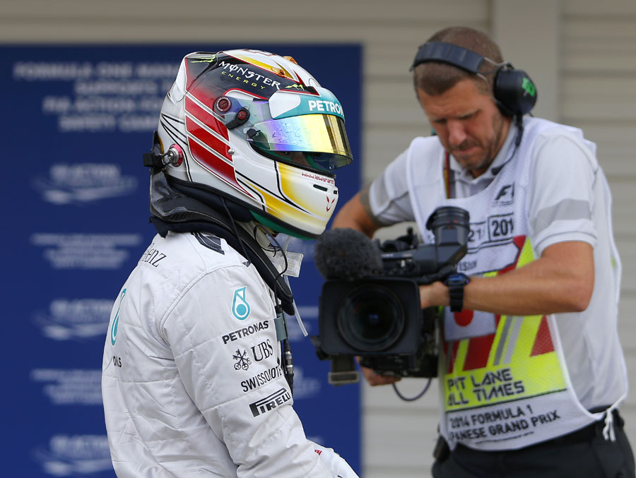 Lewis Hamilton in parc ferme after being beaten to pole by Nico Rosberg