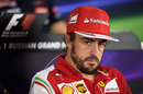 Fernando Alonso looks on in the Thursday press conference