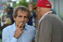 Alain Prost talks to Niki Lauda in the paddock