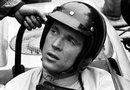 Dan Gurney looks on from the cockpit of his Porsche 