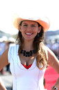 A cowgirl poses for the camera ahead of the race