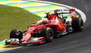 Kimi Raikkonen plants his Ferrari on the kerbs in practice