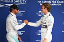 Lewis Hamilton congratulates Nico Rosberg on his tenth pole of the season