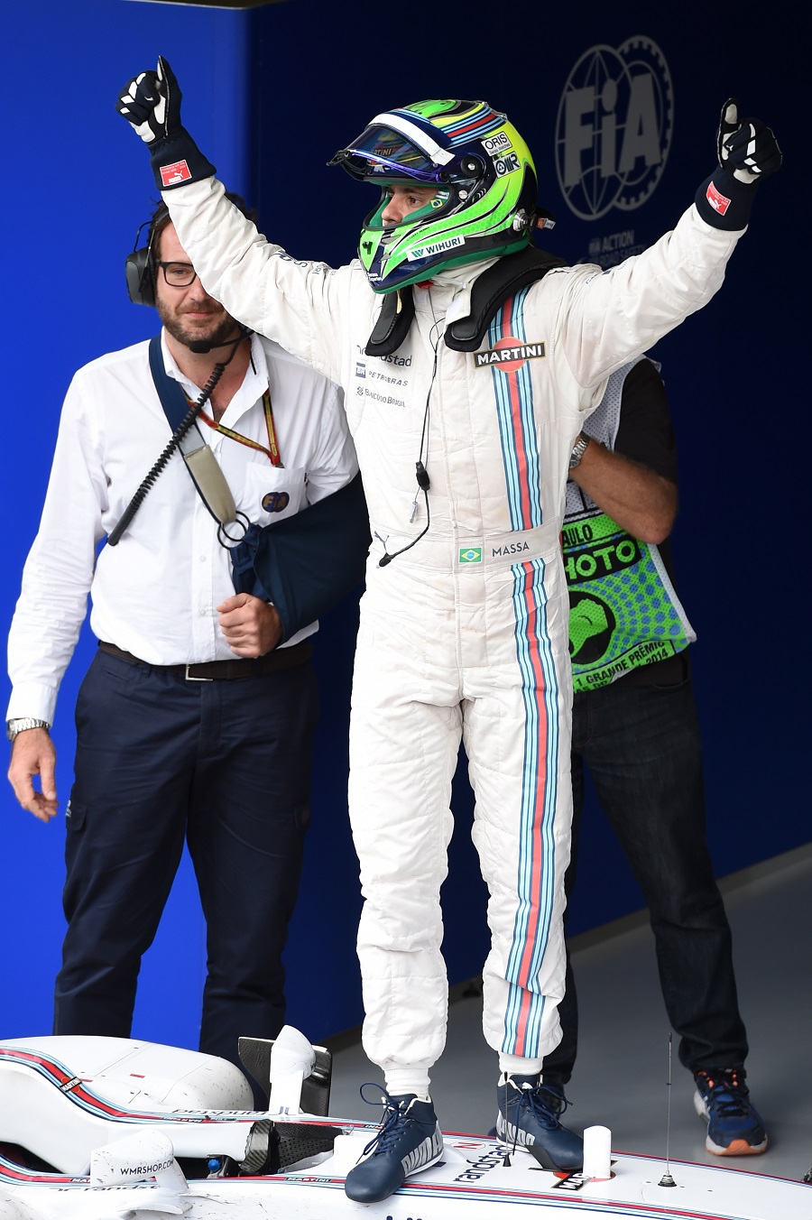 Brazilian Felipe Massa celebrates third place