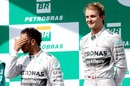 Nico Rosberg looks on after beating team-mate Lewis Hamilton