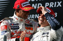 Lewis Hamilton congratulates Nico Rosberg on his first podium finish
