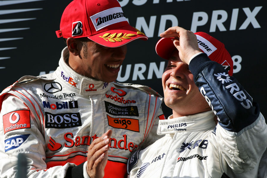Lewis Hamilton congratulates Nico Rosberg on his first podium finish
