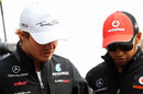 Nico Rosberg talks to Lewis Hamilton in the paddock