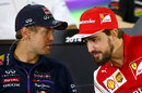Sebastian Vettel talks to Fernando Alonso, the man he will replace at Ferrari, on Thursday