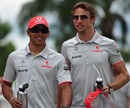 Lewis Hamilton and Jenson Button arrive at the circuit on race day