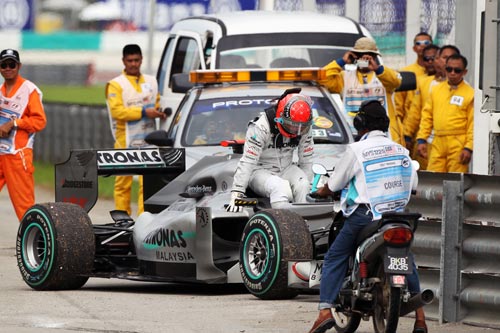 Michael Schumacher retires from the Malaysian Grand Prix
