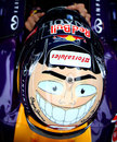 Daniel Ricciardo shows off his one-off helmet for the season finale