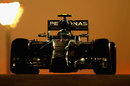 Nico Rosberg powers down under the floodlights in qualifying