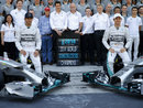 Lewis Hamilton, Nico Rosberg and the Mercedes team pose for a photo ahead of the season finale