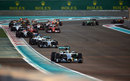 Lewis Hamilton leads Nico Rosberg and the chasing pack out of Turn 1
