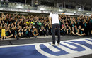 Nico Rosberg salutes Mercedes as the team applauds the championship runner-up