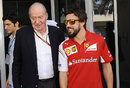King Juan Carlos I of Spain and Fernando Alonso in the paddock