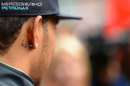 Lewis Hamilton displays his #44 tattoo