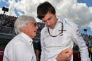 Bernie Ecclestone speaks to Mercedes boss Toto Wolff on the grid